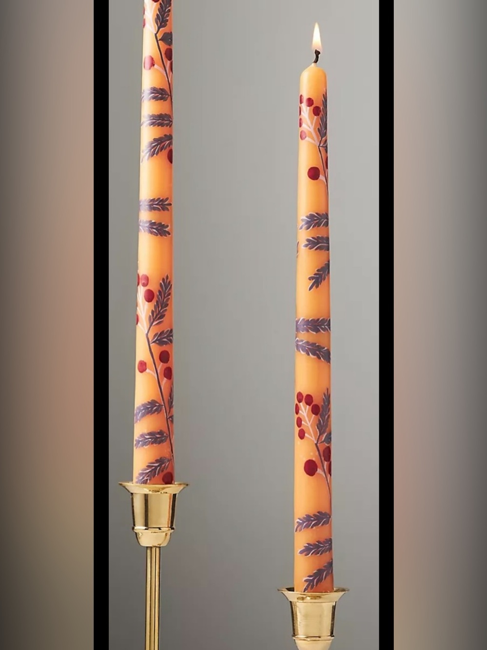 Anthropologie Hand-Painted Orange Taper Candles.